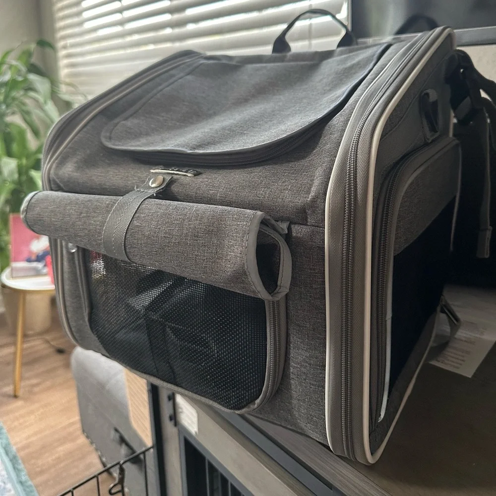 Dog bag is also suitable for the car. It's totally new, with label and plastic.